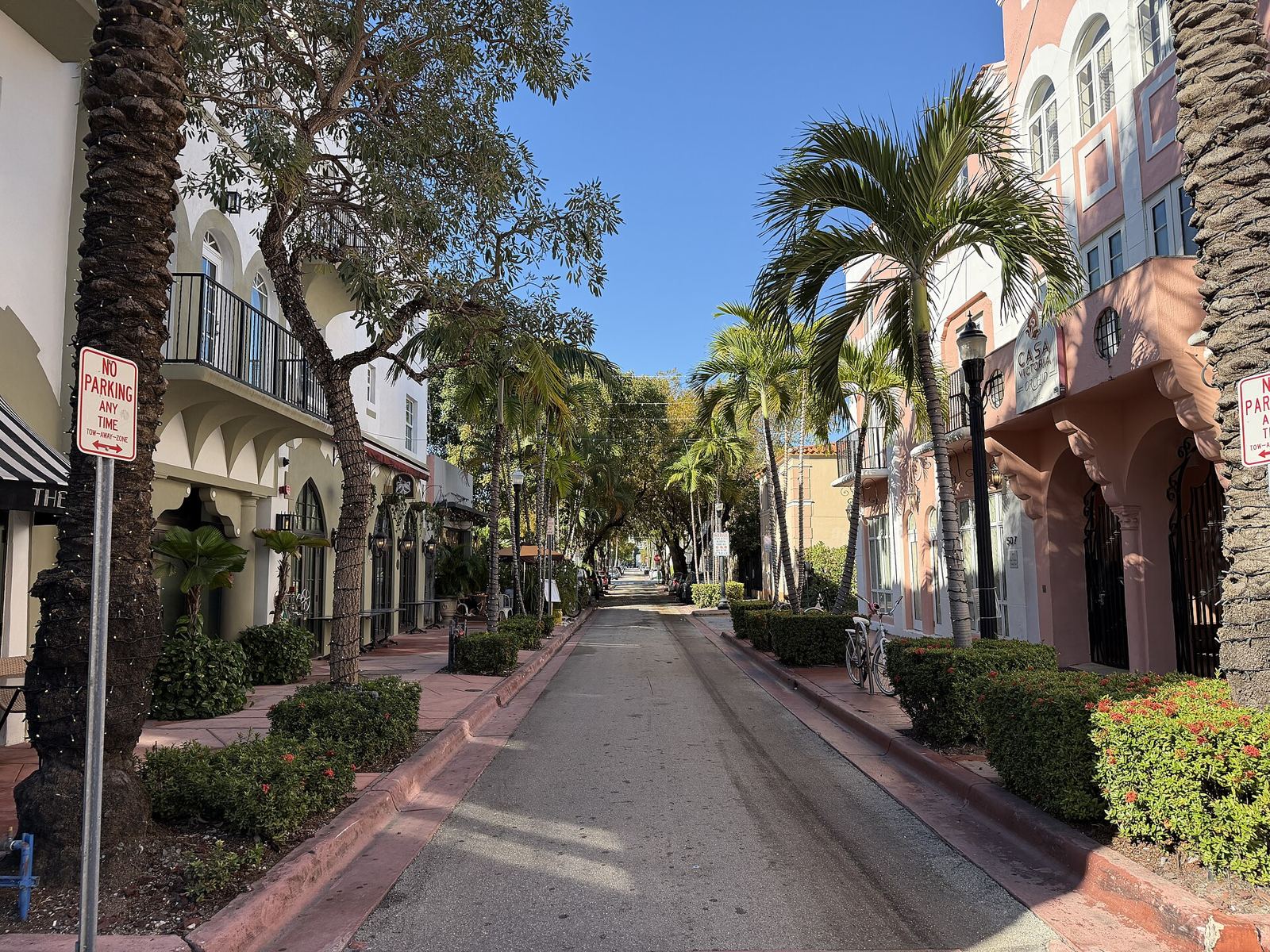 Mediterranean-style buildings and palms along Española Way