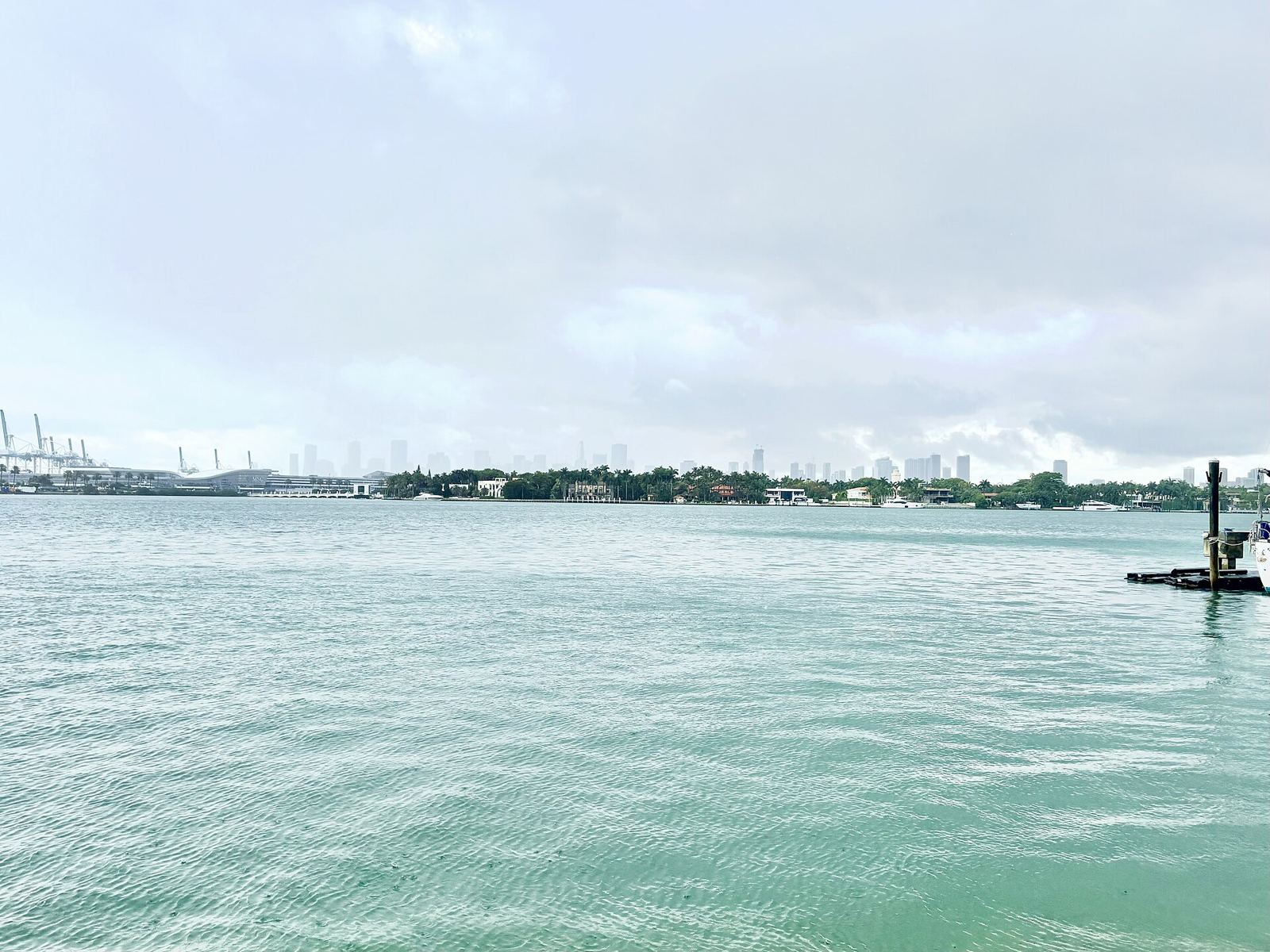 Gray rain clouds over Biscayne Bay seen from Miami Beach