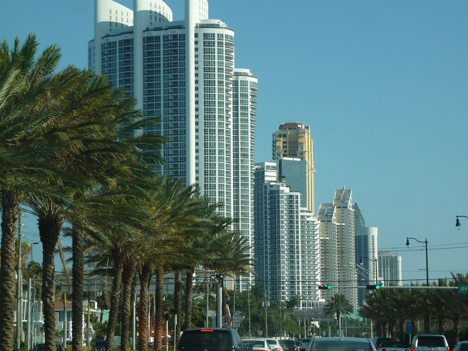 Condo towers line Collins Avenue in Sunny Isles Beach, seen from the north
