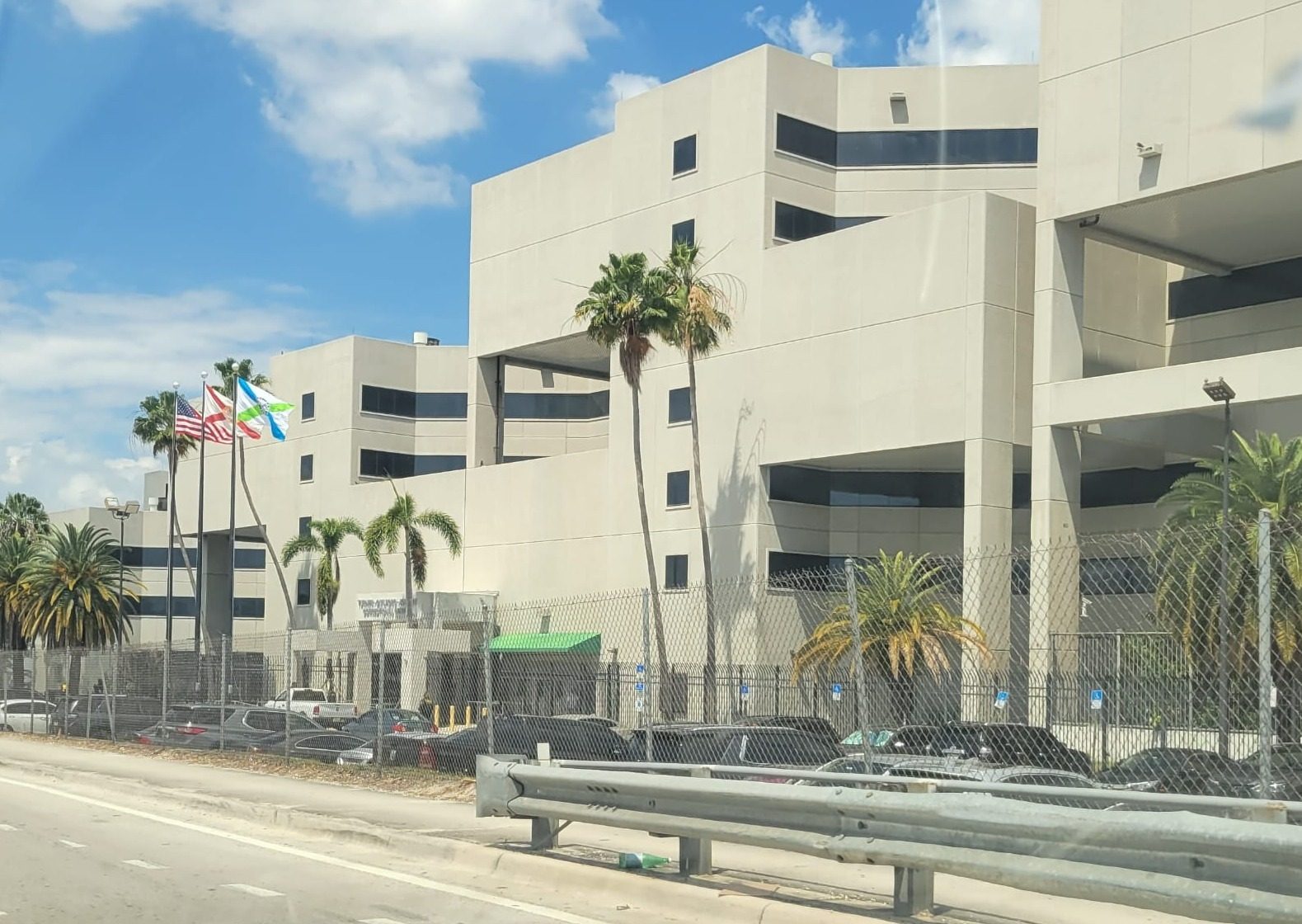The Turner Guilford Knight Correctional Center, a beige multi-story building behind a chain-link fence